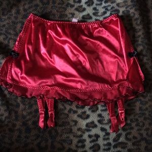 Victoria’s Secret lingerie skirt with garter clips
